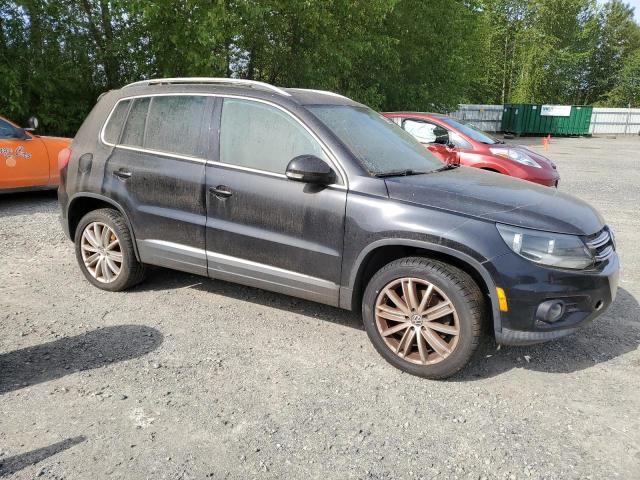 WVGBV7AX2CW553552 - 2012 VOLKSWAGEN TIGUAN S BLACK photo 4