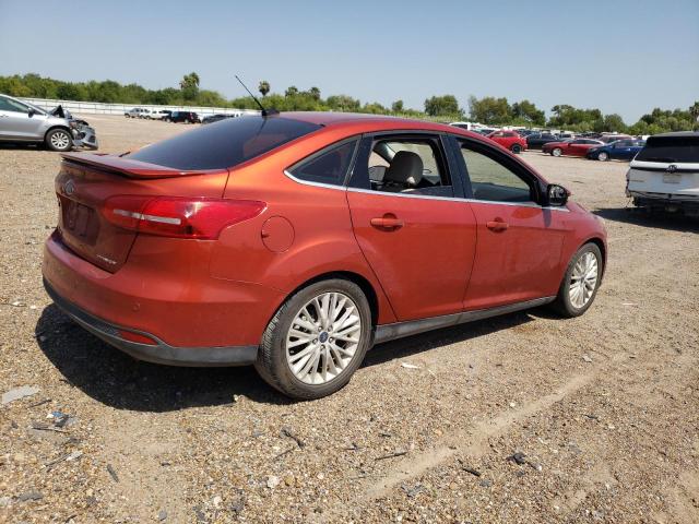 1FADP3J29JL281140 - 2018 FORD FOCUS TITANIUM ORANGE photo 3