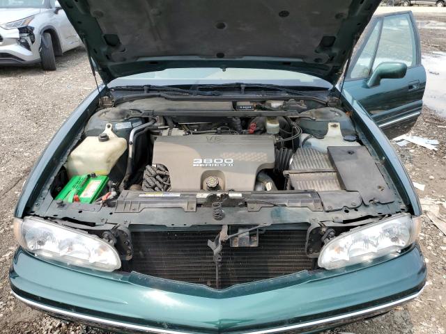 1G2HX52K6VH221366 - 1997 PONTIAC BONNEVILLE SE GREEN photo 11