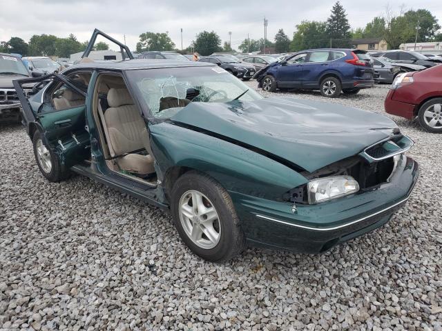 1G2HX52K6VH221366 - 1997 PONTIAC BONNEVILLE SE GREEN photo 4