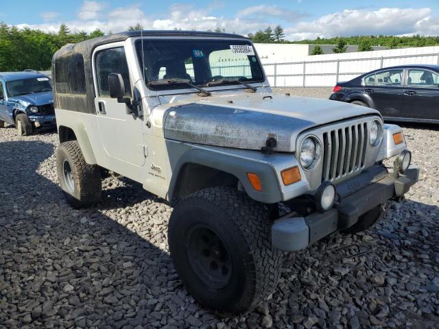 1J4FA49S34P775497 - 2004 JEEP WRANGLER / SPORT GRAY photo 4