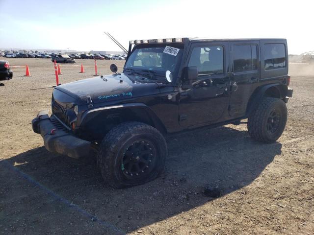 1J4BA3H12BL579556 - 2011 JEEP WRANGLER U SPORT BLACK photo 1