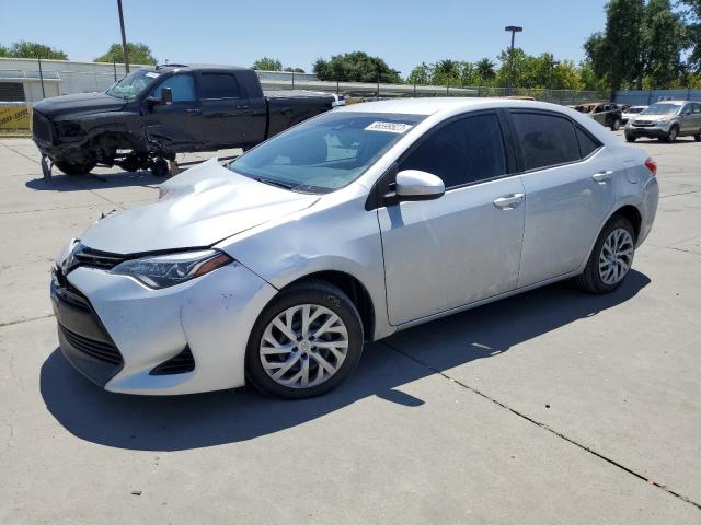 2T1BURHE4JC119503 - 2018 TOYOTA COROLLA L SILVER photo 1