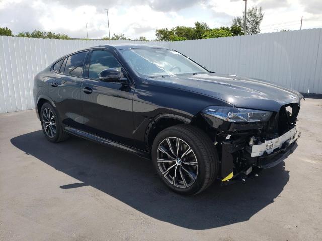5UX33EX04R9U84981 - 2024 BMW X6 XDRIVE40I BLACK photo 4