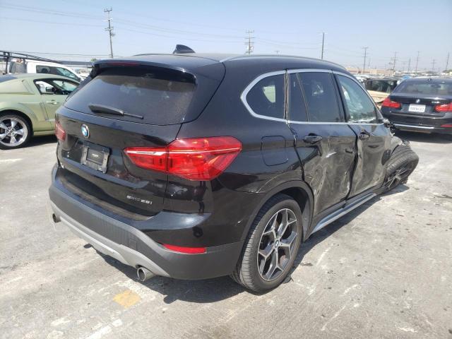 WBXHU7C30J5L06712 - 2018 BMW X1 SDRIVE28I BLACK photo 4