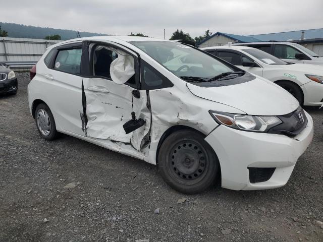 3HGGK5H57FM734339 - 2015 HONDA FIT LX WHITE photo 4