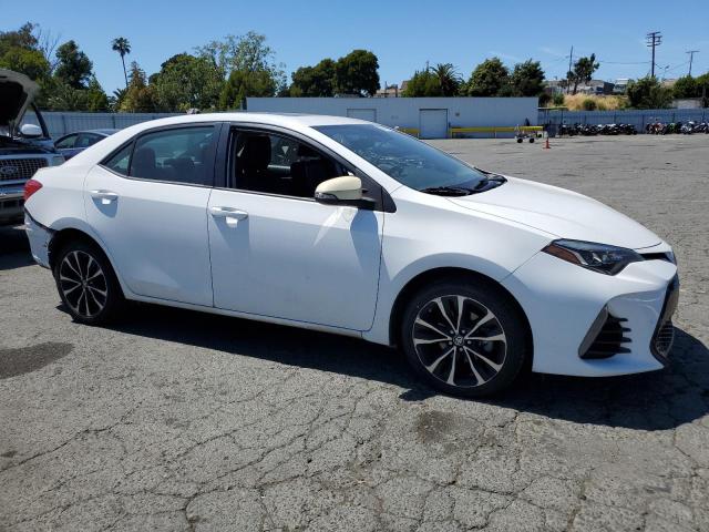 5YFBURHEXHP615075 - 2017 TOYOTA COROLLA L WHITE photo 4