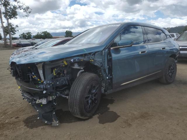 WB523CF03SCU37352 - 2025 BMW IX XDRIVE50 TEAL photo 1