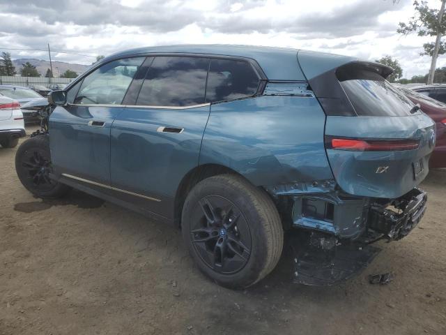 WB523CF03SCU37352 - 2025 BMW IX XDRIVE50 TEAL photo 2