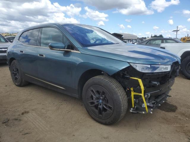 WB523CF03SCU37352 - 2025 BMW IX XDRIVE50 TEAL photo 4