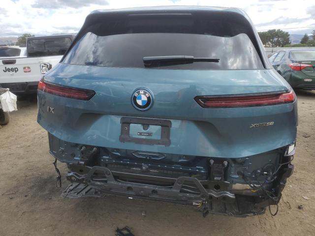 WB523CF03SCU37352 - 2025 BMW IX XDRIVE50 TEAL photo 6