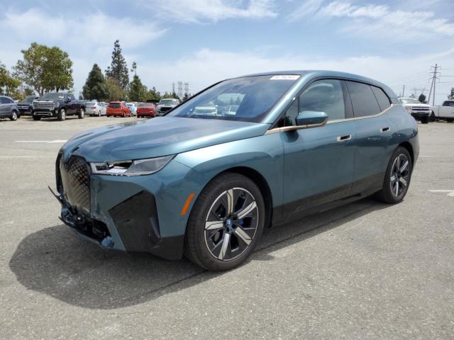 WB523CF09PCL83112 - 2023 BMW IX XDRIVE50 Dəniz mavisi foto 1