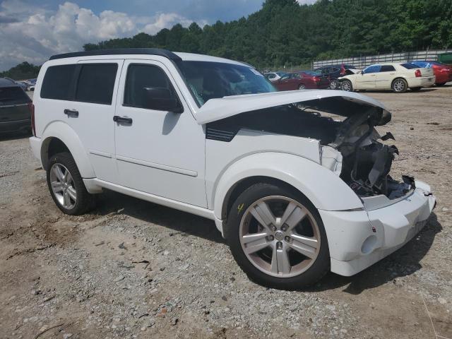 1D4PT4GX6BW606616 - 2011 DODGE NITRO HEAT WHITE photo 4