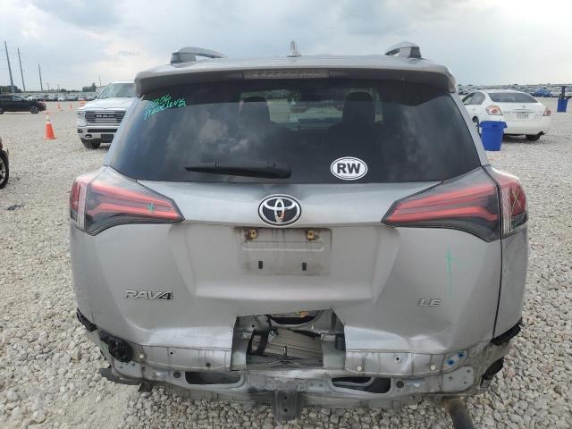 2T3ZFREV0JW465888 - 2018 TOYOTA RAV4 LE SILVER photo 6