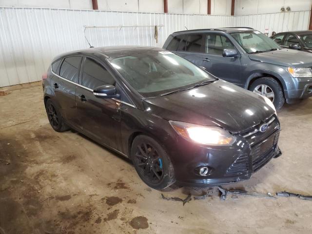 1FAHP3N26CL451405 - 2012 FORD FOCUS TITANIUM BLACK photo 4