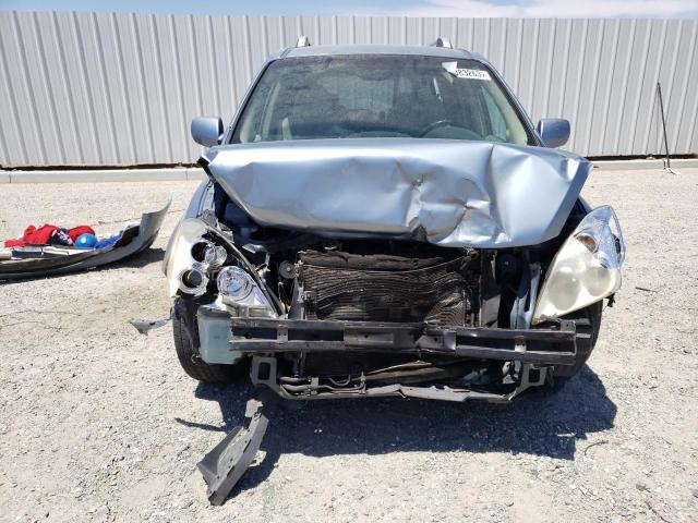 KNDMC233376025315 - 2007 HYUNDAI ENTOURAGE GLS BLUE photo 5