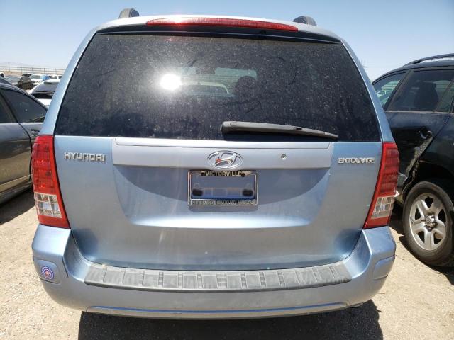 KNDMC233376025315 - 2007 HYUNDAI ENTOURAGE GLS BLUE photo 6