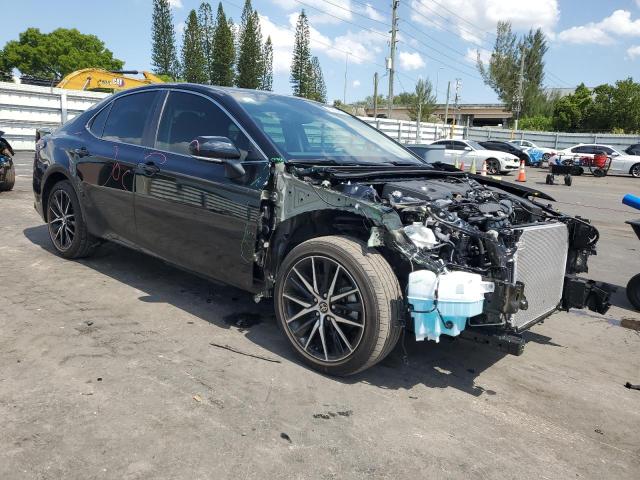 4T1S11AK6RU239369 - 2024 TOYOTA CAMRY SE NIGHT SHADE BLACK photo 4