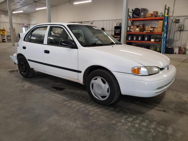 1Y1SK5481XZ439581 - 1999 CHEVROLET GEO PRIZM BASE WHITE photo 4