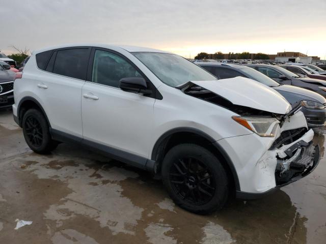 2T3ZFREV5JW453719 - 2018 TOYOTA RAV4 LE WHITE photo 4