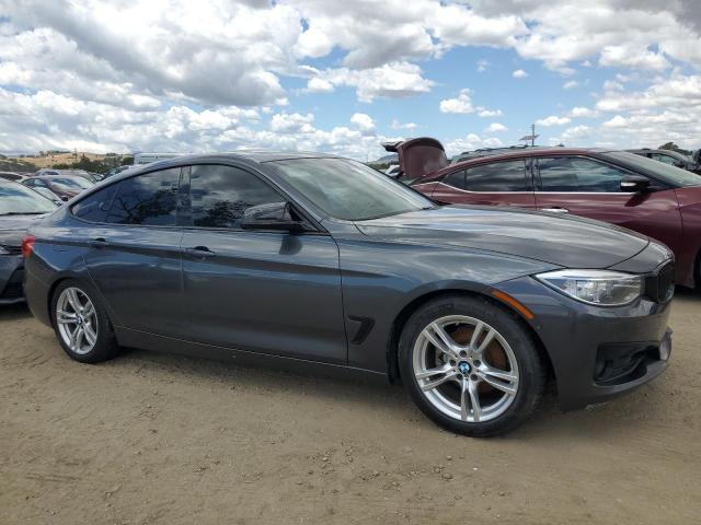 WBA8Z5C54FGS36015 - 2015 BMW 3 SERIES XIGT SULEV CHARCOAL photo 4
