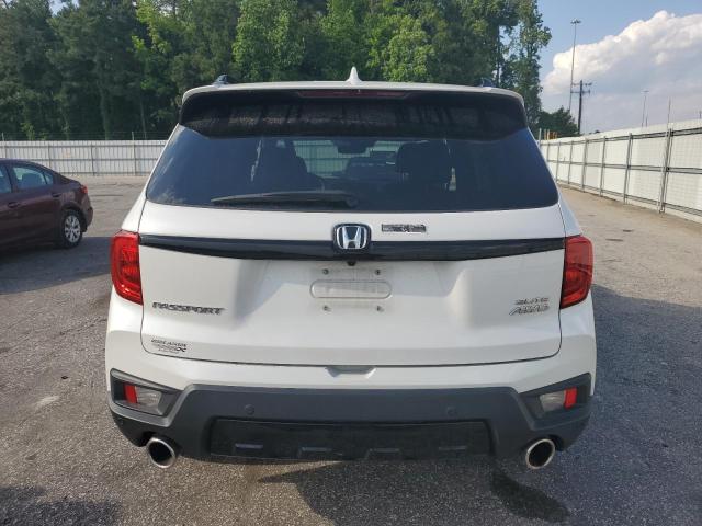 5FNYF8H09PB007934 - 2023 HONDA PASSPORT ELITE Белый фото 6
