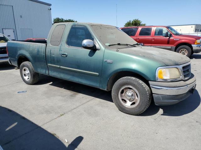 1FTZX1729YNB82957 - 2000 FORD F-150 GREEN photo 4