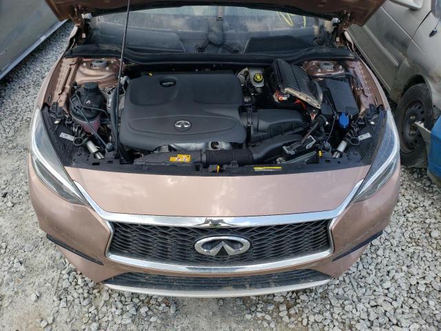 SJKCH5CP1JA059739 - 2018 INFINITI QX30 BASE PINK photo 12