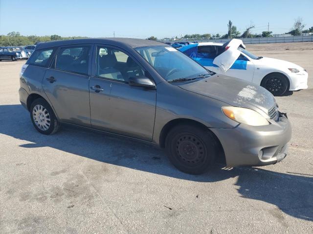 2T1KR32E27C646682 - 2007 TOYOTA COROLLA MA XR GRAY photo 4