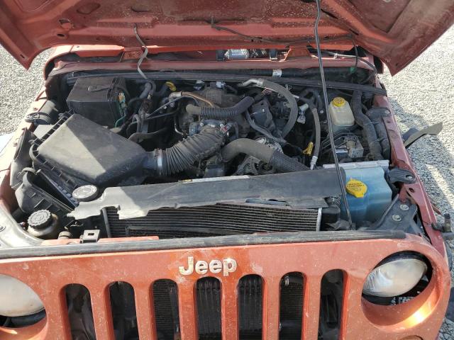 1J4GA39129L774104 - 2009 JEEP WRANGLER U X ORANGE photo 11