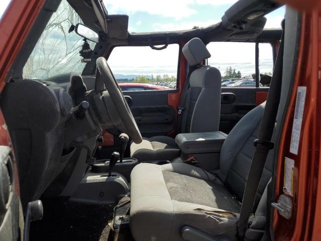 1J4GA39129L774104 - 2009 JEEP WRANGLER U X ORANGE photo 7