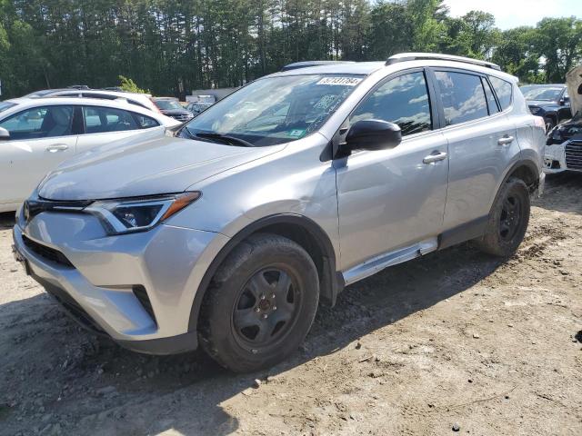 JTMBFREV7JD254167 - 2018 TOYOTA RAV4 LE SILVER photo 1