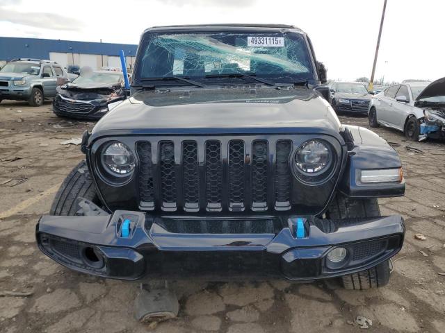1C4JJXP60NW214074 - 2022 JEEP WRANGLER U SAHARA 4XE BLACK photo 5
