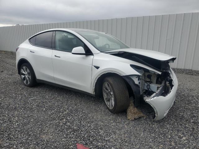 7SAYGDEE7PF661825 - 2023 TESLA MODEL Y Weiß Foto 4