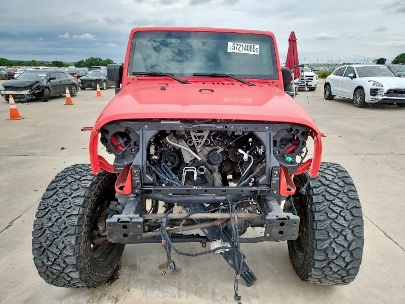 1C4BJWDG8GL146980 - 2016 JEEP WRANGLER U SPORT Червоний фото 5