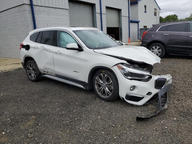 WBXHT3Z35H4A55613 - 2017 BMW X1 XDRIVE28I WHITE photo 4