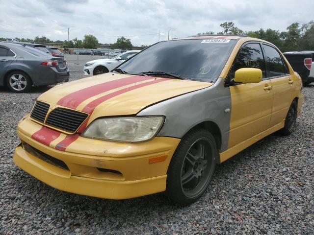 JA3AJ86E92U007672 - 2002 MITSUBISHI LANCER OZ RALLY YELLOW photo 1