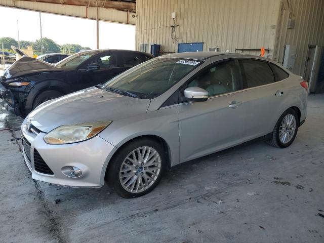 1FAHP3H2XCL348869 - 2012 FORD FOCUS SEL SILVER photo 1