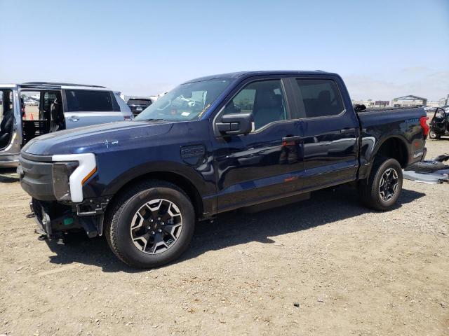 1FTVW1EL8NWG05272 - 2022 FORD F150 LIGHTNING PRO BLUE photo 1