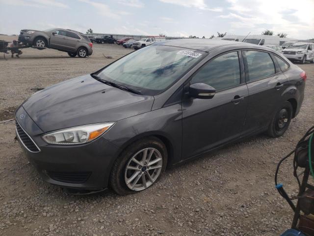 1FADP3F25HL283423 - 2017 FORD FOCUS SE GRAY photo 1