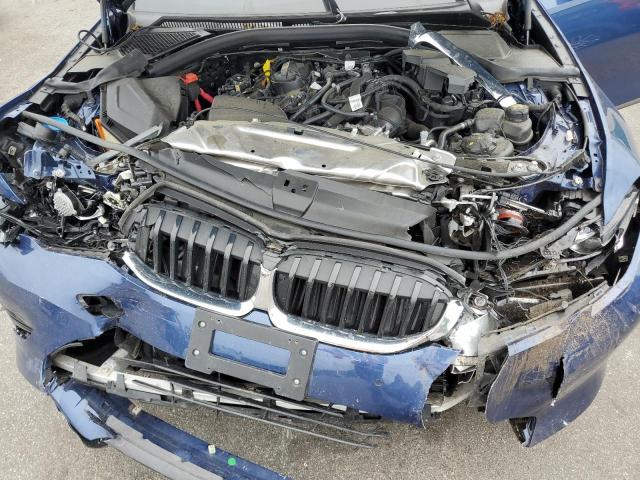 3MW5R7J02N8C26358 - 2022 BMW 330XI BLUE photo 11