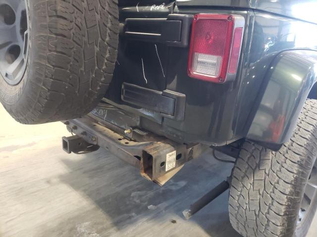 1J4BA5H10BL557387 - 2011 JEEP WRANGLER U SAHARA GREEN photo 9