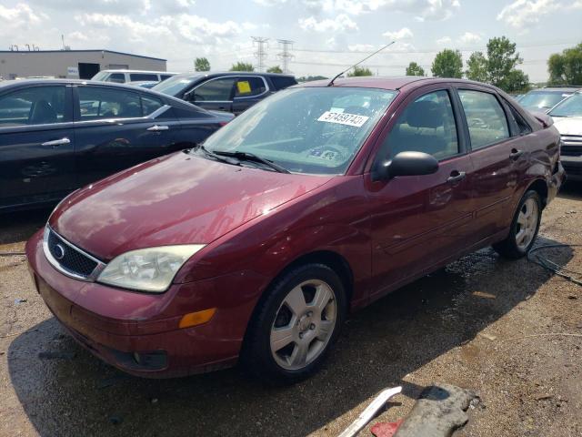 1FAHP34NX7W180283 - 2007 FORD FOCUS ZX4 BURGUNDY photo 1