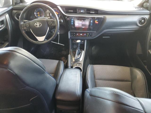 5YFBURHE9JP797762 - 2018 TOYOTA COROLLA L GREEN photo 8