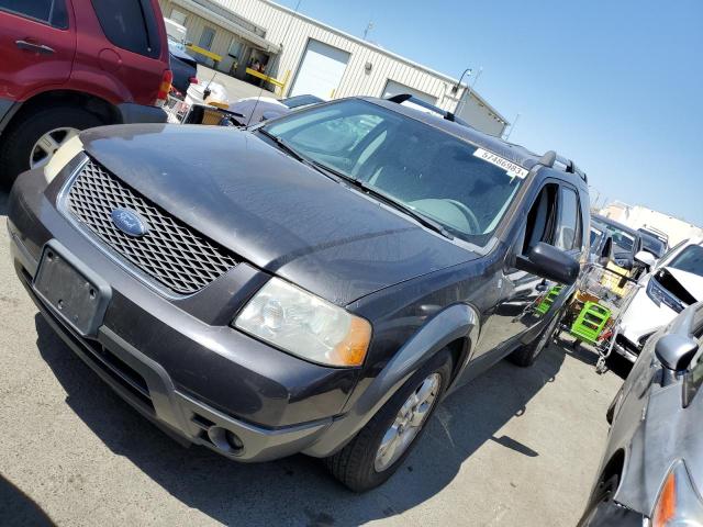 1FMDK051X7GA03871 - 2007 FORD FREESTYLE SEL BLACK photo 1