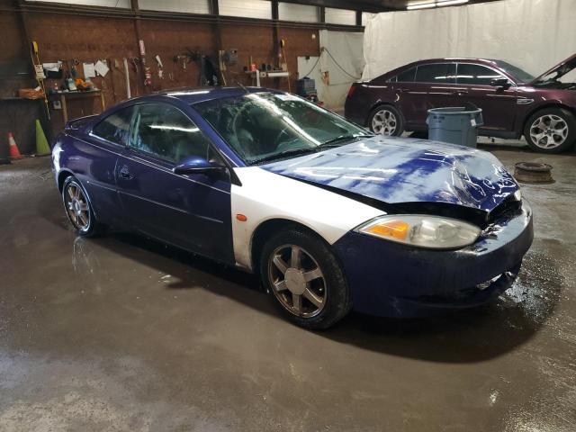 1ZWFT61L1X5679036 - 1999 MERCURY COUGAR V6 BLUE photo 4