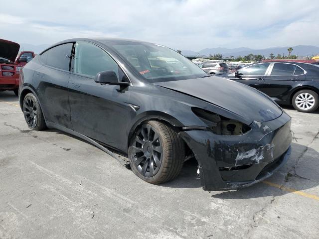 7SAYGAEE2PF825495 - 2023 TESLA MODEL Y BLACK photo 4