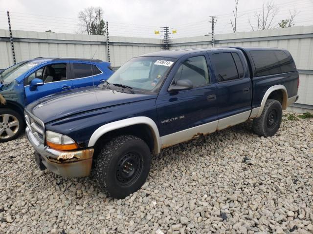 1B7HG2AN11S317022 - 2001 DODGE DAKOTA QUAD BLUE photo 1