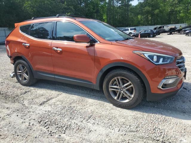 5XYZU3LB9HG467126 - 2017 HYUNDAI SANTA FE S ORANGE photo 4