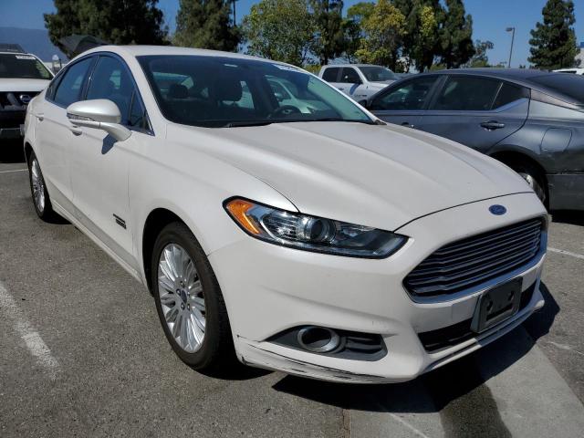 3FA6P0PU7FR226002 - 2015 FORD FUSION SE PHEV WHITE photo 4